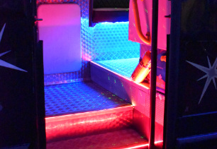 Outside view of passenger door and disco lighting