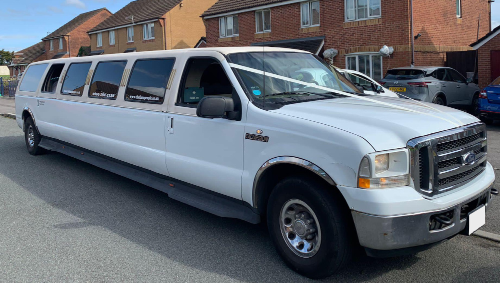 White 16-seater limousine